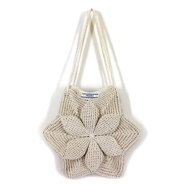 a knitted bag on a wall PRIGRIZ
