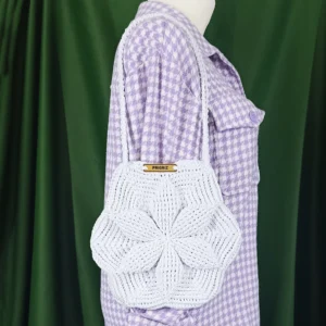 a mannequin wearing a purple and white checkered shirt PRIGRIZ